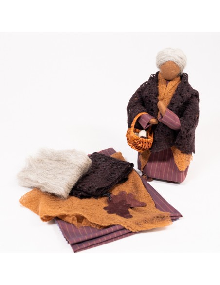 Kleiderstoffe, Perücke und Schuhe für Nomadenfrau